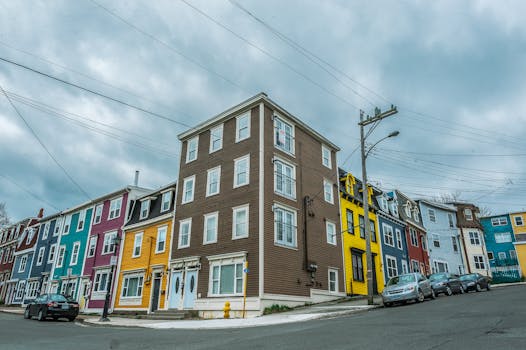 Charming street with colorful houses in an urban setting, ideal for travel or architecture themes.